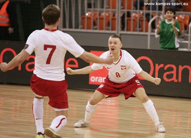 Goal for Poland! One minute to the end: Michal Slonina signed the definitive 2-2 tie between Poland and Belarus. Team mate Marcin Stanislawski is waiting for a sport hug! (Photo courtesy: Kamil Pastusiak - Sports Photography Agency KamPas Sport)