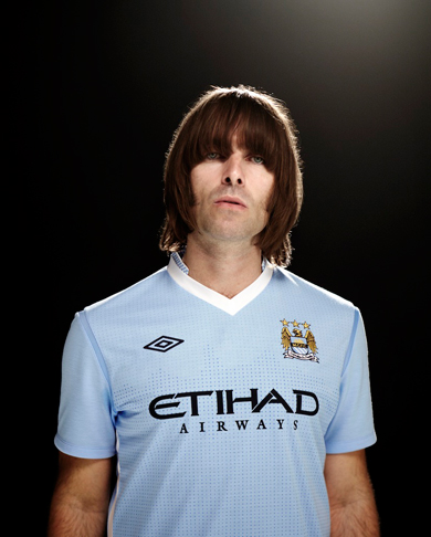 Liam Gallagher wearing the Manchester City shirt