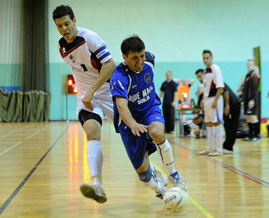 Sergei Musteata (Blue Magic) takes on Hygo Cesar (EID Futsal) (Photo courtesy: Airtricity League)