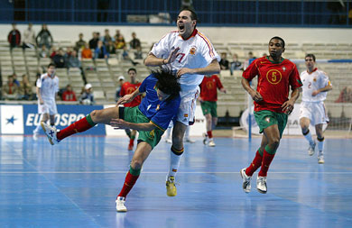 Dangerous duel between Marcelinho (Por) and Javi Rodriguez (Spa) (Photo courtesy: Joe Pepler - UEFA.com)