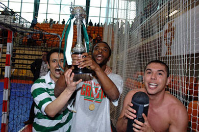 Andrezinho, Beb and Paulinho running with the Cup! (Photo courtesy: Futsal Sporting)