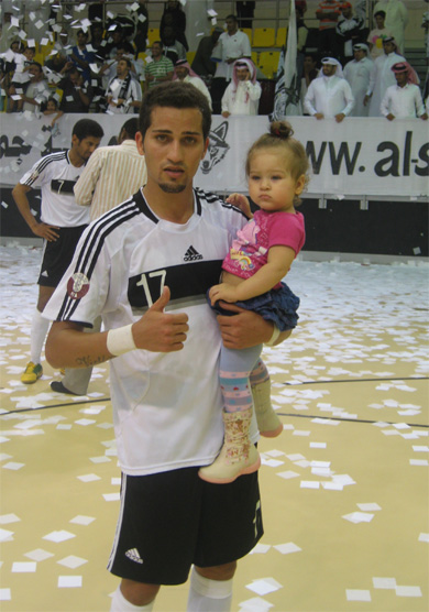 Rodriguinho, best player and league top scorer, with his little daughter Victoria. Both celebrating the Qatari futsal title! (Photo courtesy: Rubio Guerra)