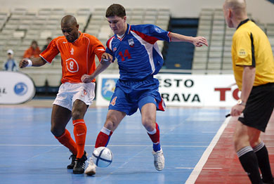 FC Marlene*s star Calvin Blankendal (Netherlands) vs the Norilsky Nickel*s player Korol (Photo courtesy: Joe Pepler - UEFA.com)
