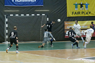 The second Toligma*s goalie Alexandre Krivoi must say thanks to Vitalie Plamadeala... (Photo courtesy: Miklos Biszkup)